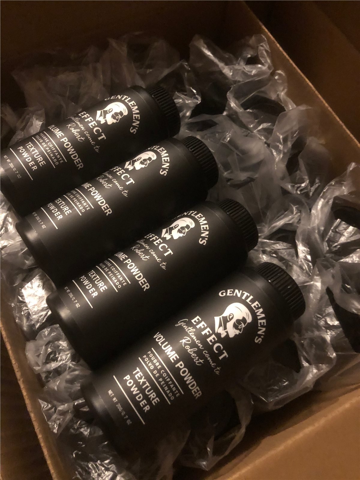 Customer-branded texture powder bottles in protective packaging